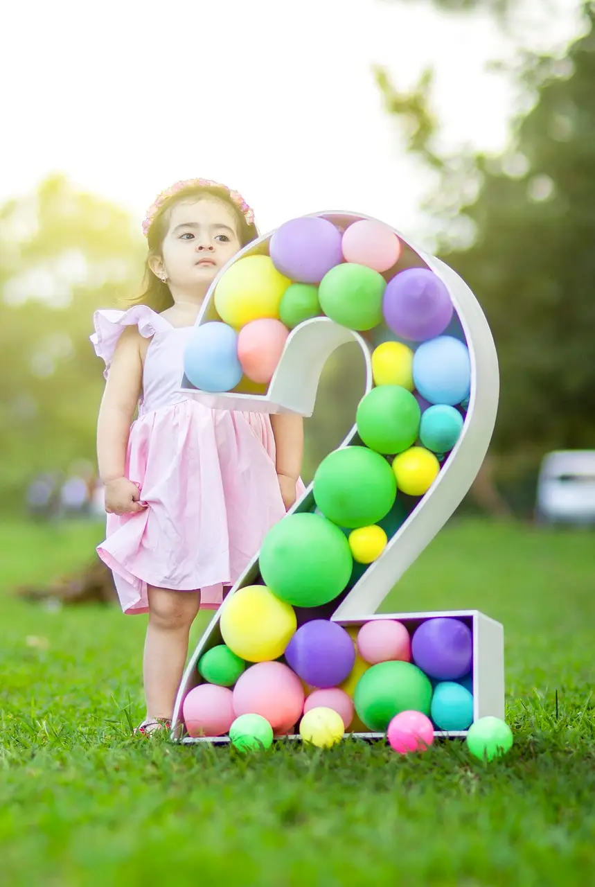 little girl, 2nd birthday, birthday celebration, birthday photoshoot, backyard, birthday party, happy birthday, childhood